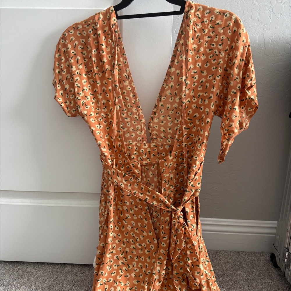 Faithfull the Brand Orange Floral Wrap Jumpsuit